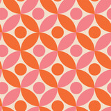 Mid century dots on pink and orange circles seamless pattern. For wallpaper, home décor and textile.