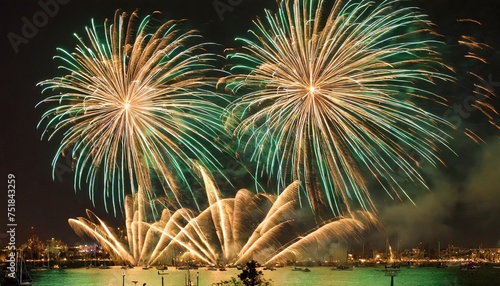 enchanting display of gold and green fireworks against a backdrop