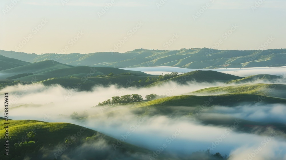 Soft morning fog over rolling hills background