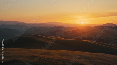 Sunset over rolling hills background