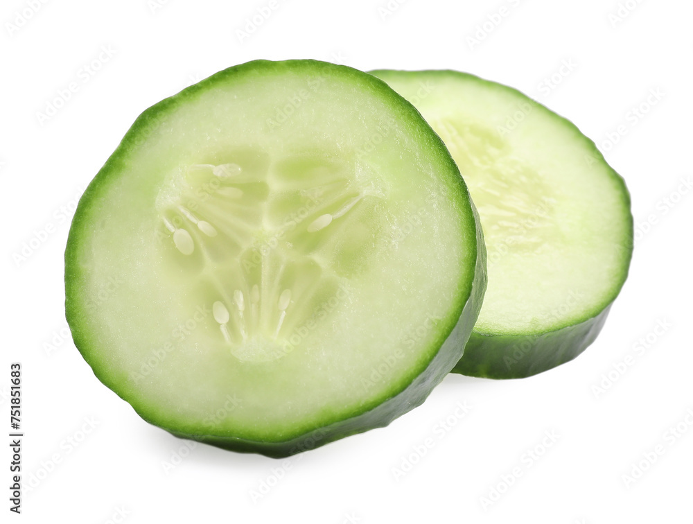 Slices of fresh cucumber isolated on white Slices of fresh cucumber isolated on white