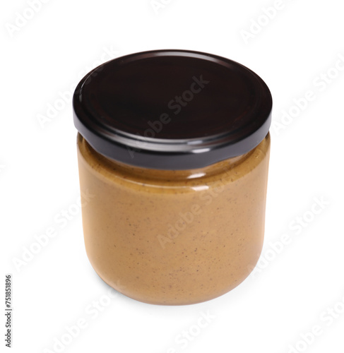 Tasty nut paste in jar isolated on white