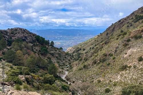 Panoramic view from hiking trail to Maroma peak in thunderstorm day, Sierra Tejeda, Spain  © Vitali