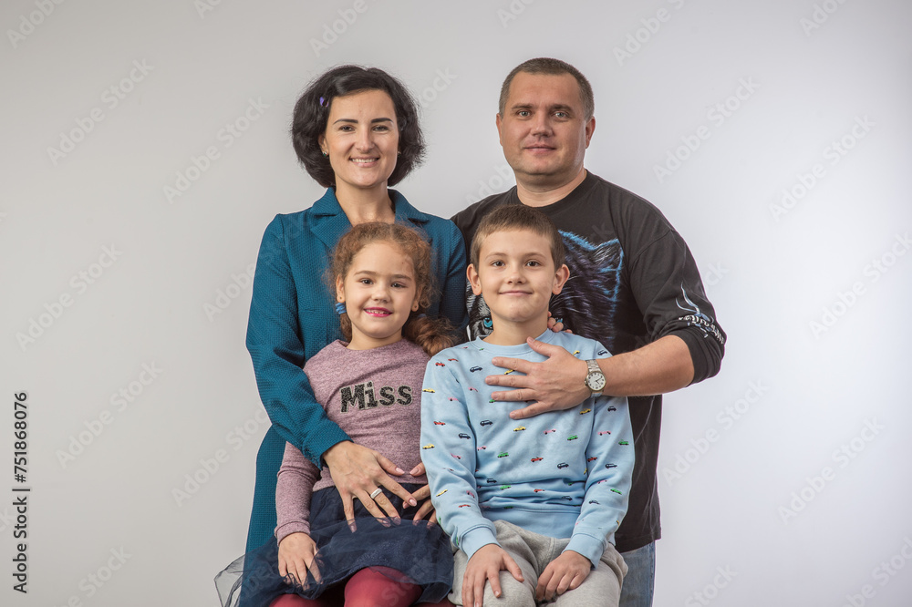studio portrait of a happy family husband wife daughter and son 7 studio portrait of a happy family husband wife daughter and son 7