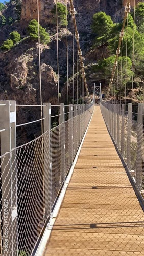 Hiking trail to Colgante bridge (Puente Colgante El Saltillo) over Almanchares river, Sierra Tejeda, Andalusia, Spain photo
