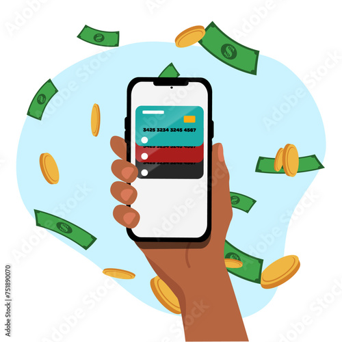 Hand holding mobile phone with credit cards and money with coins around