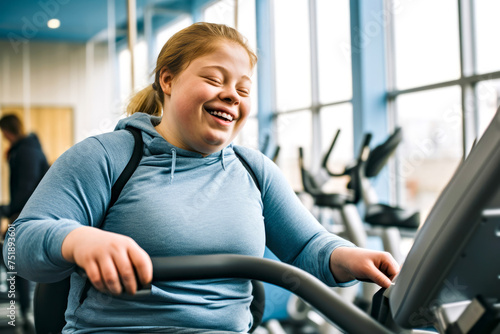 A woman with Down syndrome enjoys a exercise routine on a cardio machine at a well-equipped gym, delight of active living. Concept of inclusivity in fitness and sports for people with disabilities photo