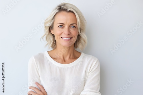 Portrait of a beautiful middle-aged woman smiling at the camera