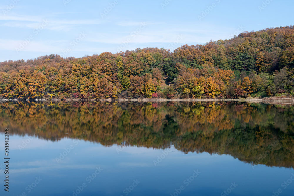 Reflection of the autumn mountain on the lake Reflection of the autumn mountain on the lake