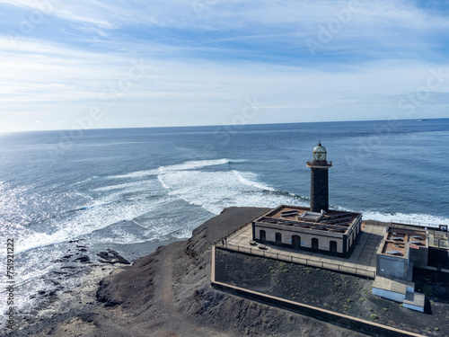 Punta de Jandia and lighthouse on southern end of Fuerteventura island, accessible only by gravel road photo