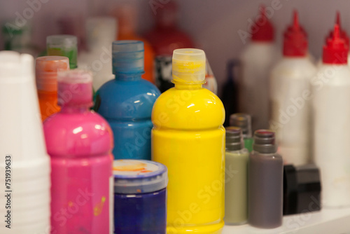 Colorful Used Bottles for Artwork Displayed on Storage Shelves