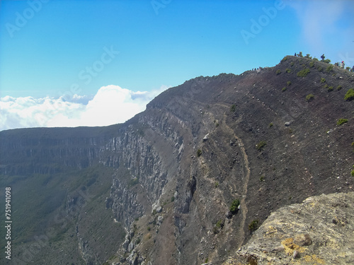 Canvas Print View of the rocky active crater wall of Mount Gede Pangrango with blue sky, West