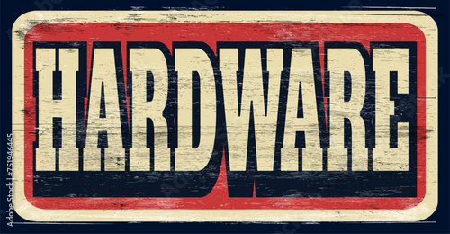 Aged and worn hardware store sign on wood