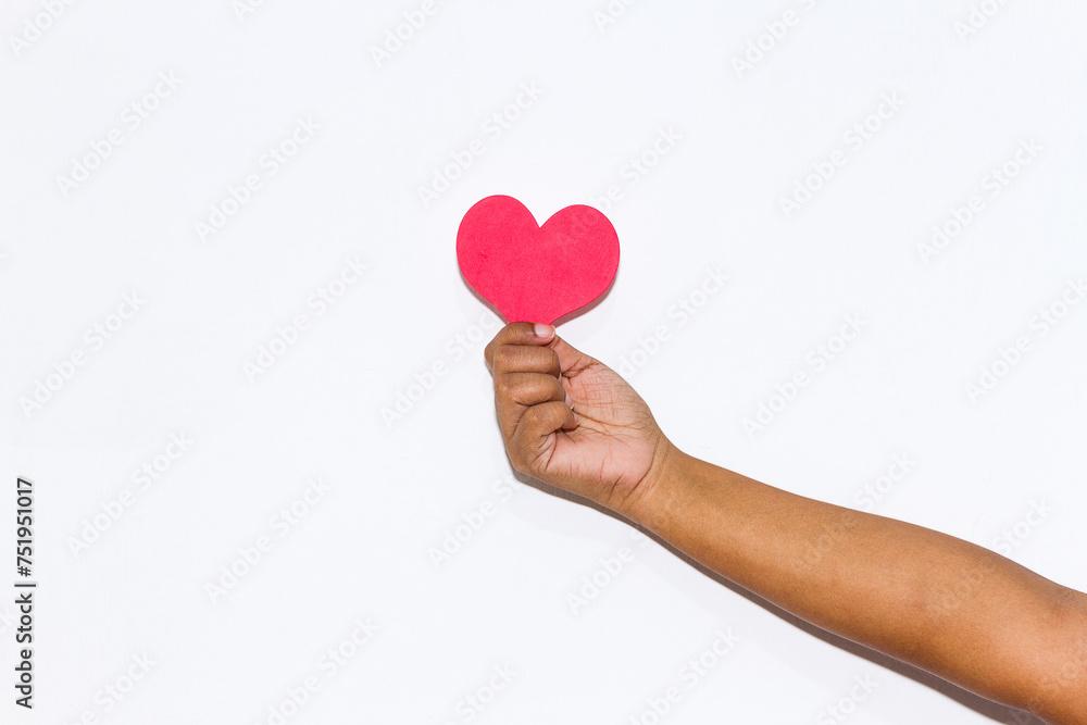 A hand holding a heart, my love for you in the palm of my hand A hand holding a heart, my love for you in the palm of my hand