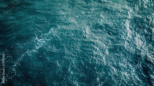 Blue sea water surface texture background. Top view. Copy space.