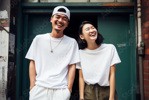 portrait of a happy couple laughing in the city, asian young people, outdoors, wearing fashion casual white streetwear, tshirts, cap, necklace, cheerful upbeat relationship