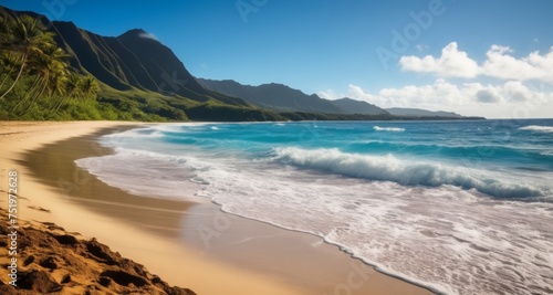  Tranquil beach scene with clear blue waters and lush green mountains