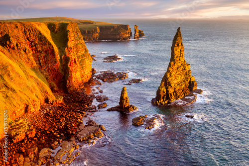 Duncansby,  Duncansby Head,  John o' Groats, Caithness, Scotland, UK - Sunrise at Stacks of Duncansby. photo