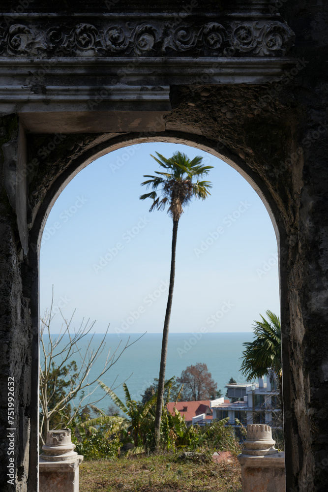 Gothic arches on blue sky background. Elements of architecture, ancient arches,  windows and apertures. architectural decorations of buildings, doorways and arches, plaster moldings, plaster patterns.