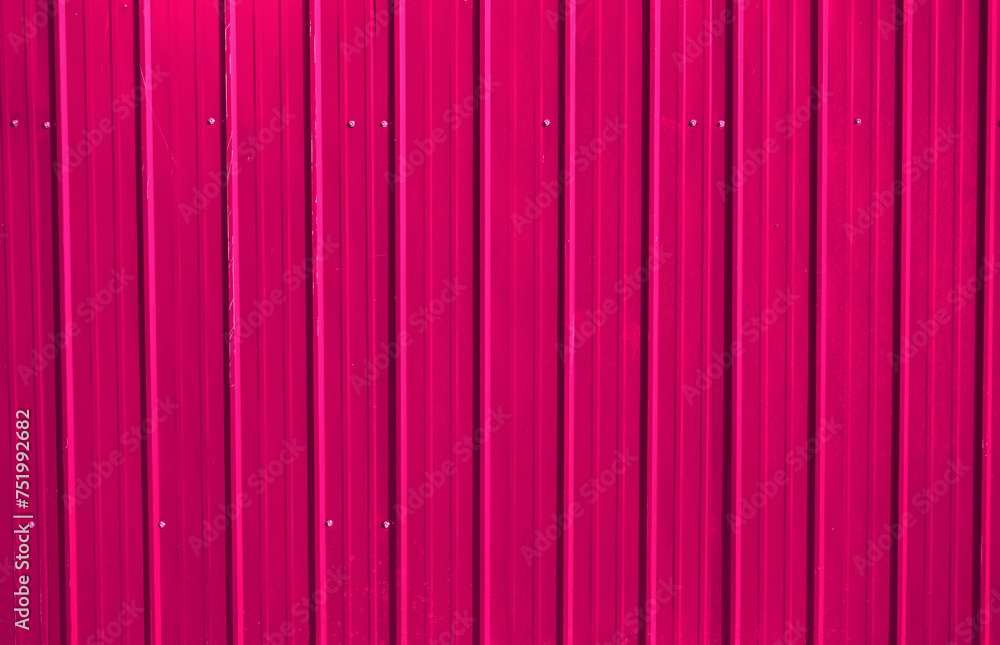 red metal decking. new, modern Sheets of yellow corrugated iron. Texture of orange metal fence, roofing. red metal decking. new, modern Sheets of yellow corrugated iron. Texture of orange metal fence, roofing.