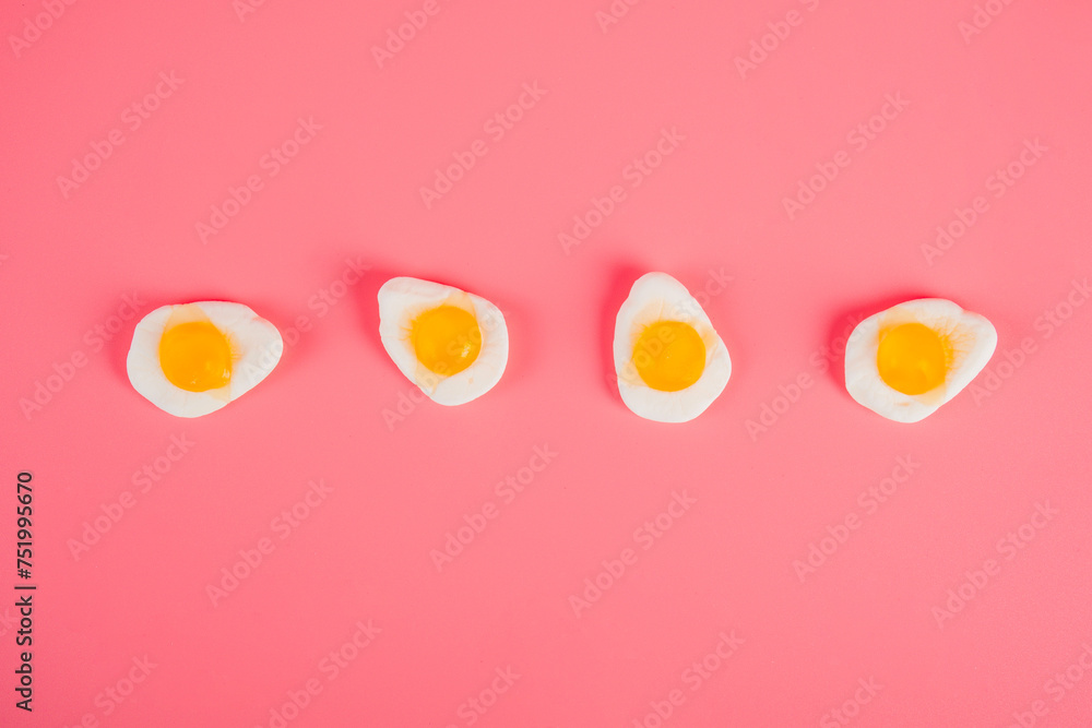 Egg jelly candy isolated on the pink background Egg jelly candy isolated on the pink background