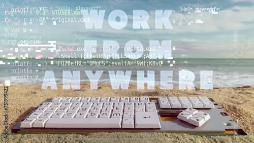 computer keyboard by the sea with words work from anywehre photo