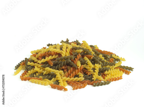 An image flat lay isolated heap or pile pasta spiral is a food raw dry for ingredient cook food a homemade white background.