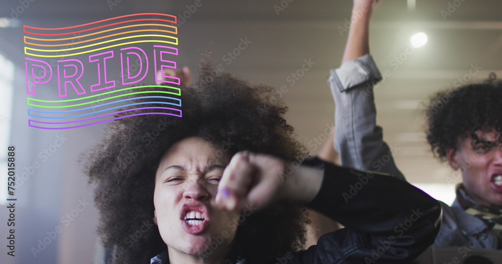 Fototapeta premium Image of rainbow pride over diverse protesters with banners