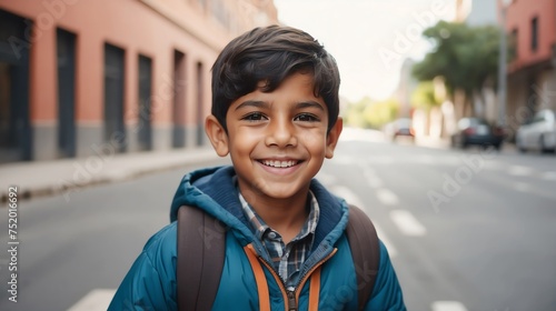 Portrait of a happy hispanic young boy kindergarten student in the middle of a city street smiling looking at camera from Generative AI