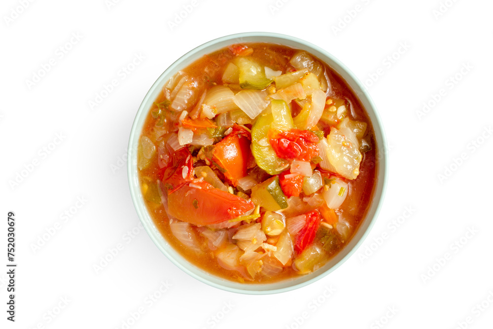 Bowl with stewed vegetable salad on white background. Top view. Vitamin salad made from natural vegetables. Bowl with stewed vegetable salad on white background. Top view. Vitamin salad made from natural vegetables.