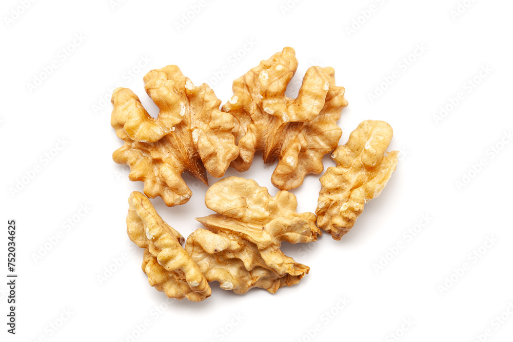 Top view of Organic cracked Walnuts (Juglans regia), isolated on a white background. Top view of Organic cracked Walnuts (Juglans regia), isolated on a white background.