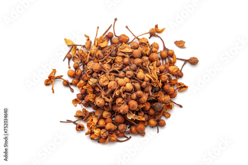 A pile of Dry Organic Ceylon
ironwood or Nagkesar (Mesua ferrea) seeds, isolated on a white background. Top view