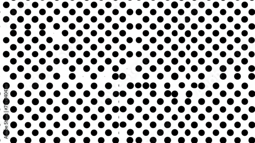 A black and white image of many small black dots