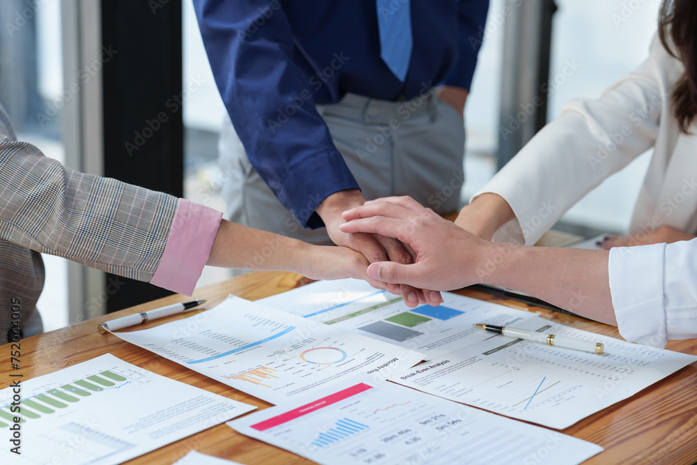 Group of business people joining hand together for making a deal. Group of business people joining hand together for making a deal.