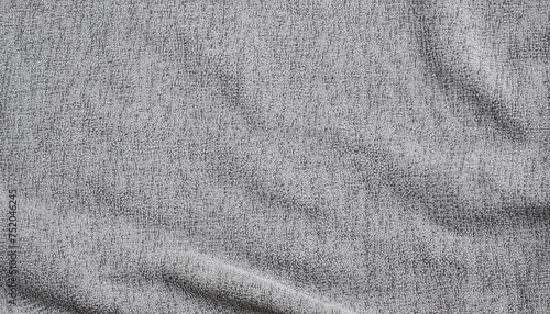 Textured wavy background of gray cotton fabric