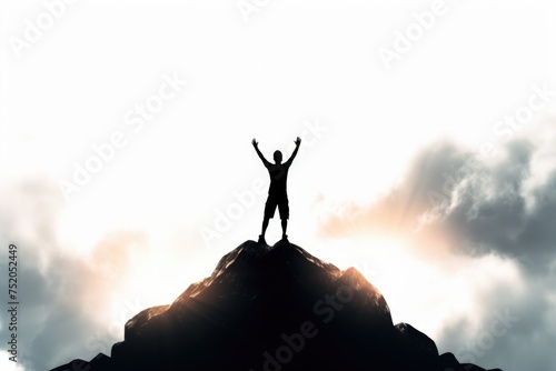 A person standing on the peak of a mountain, suitable for outdoor and adventure concepts