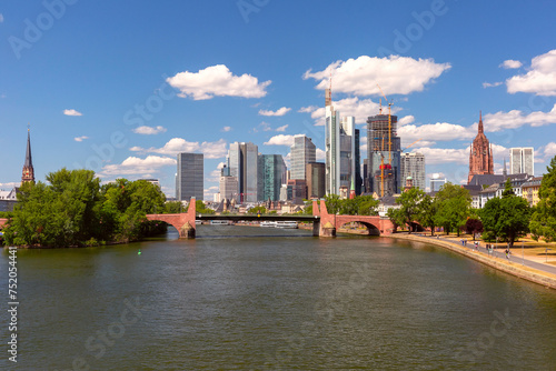 Picturesque view of business district with skyscrapers along river in Frankfurt am Main  Germany