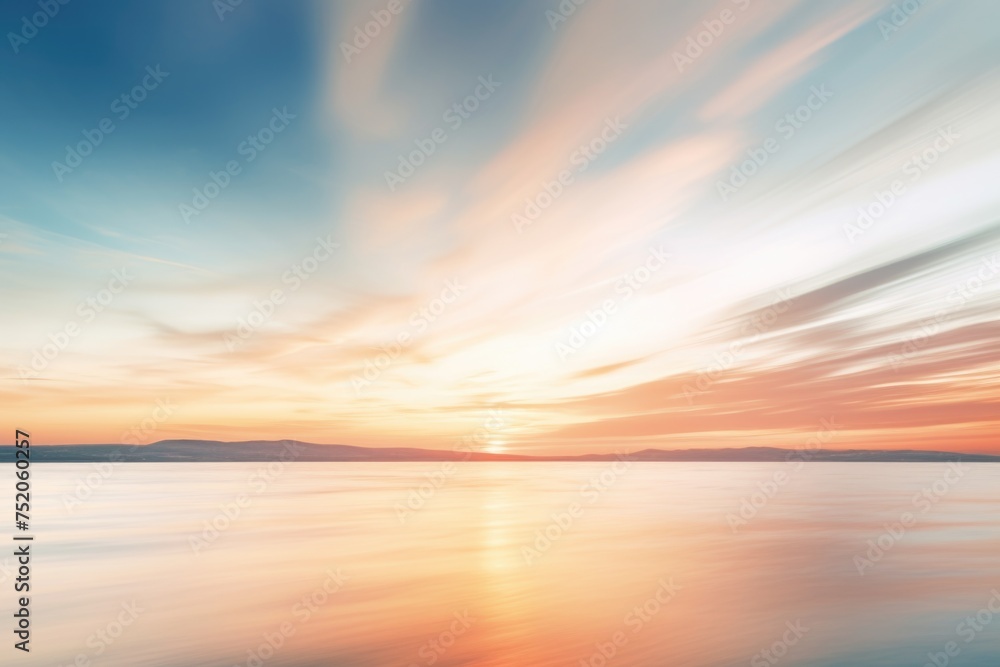 A beautiful sunset scene over a calm body of water. Perfect for nature and travel concepts