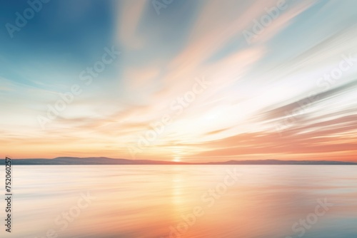 A beautiful sunset scene over a calm body of water. Perfect for nature and travel concepts