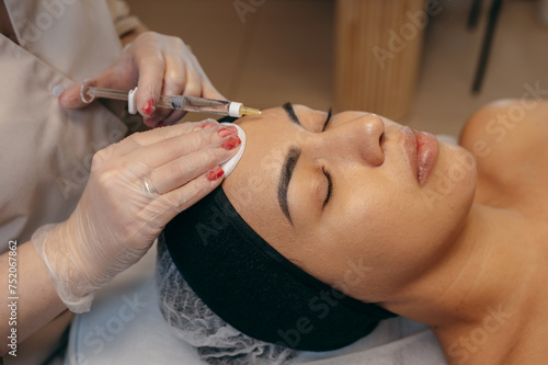 Facial injection in a beauty salon