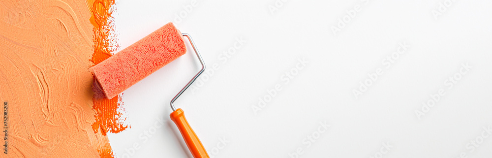 Obraz premium Paint Roller with peach paint banner. painting wall Painting apartment, renovating with trendy peach color paint. Decoration Materials special offer, sale banner.