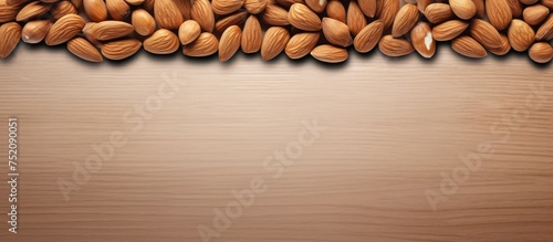 Aesthetic Almond Nuts Background with Space for Text - Healthy Eating Concept © vxnaghiyev