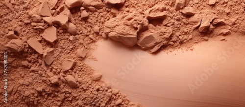 Sensory Delight: Close-Up of Rich Brown Powder Pile - Beauty Texture and Cosmetics Concept photo