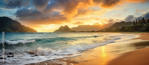 Majestic Sunrise Illuminates Kauai North Shore with Radiant Glow and Crashing Waves