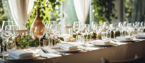 Elegant Table Setting with a Stylish Wine Bottle for a Lavish Wedding Reception Event