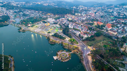 Da Lat, Vietnam - February 21st, 2024: Da Lat city night with urban areas, markets, sparkling hotels, simple transportation system attracts tourists to visit on weekends in Da lat, Vietnam