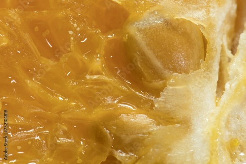 Vivid Orange Essence: A Macro Journey into Citrus Beauty, Dive into the intricate world of an orange slice, where every seed and juice-filled cell is a testament to nature's artistry. This macro shot