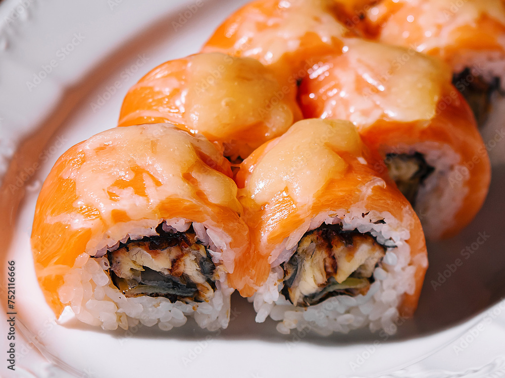 Salmon Fried sushi roll with eel and cheese Salmon Fried sushi roll with eel and cheese