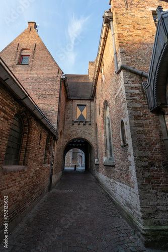 Street in the old town of the beautiful city of Bruges in Belgium  with its historic facades.