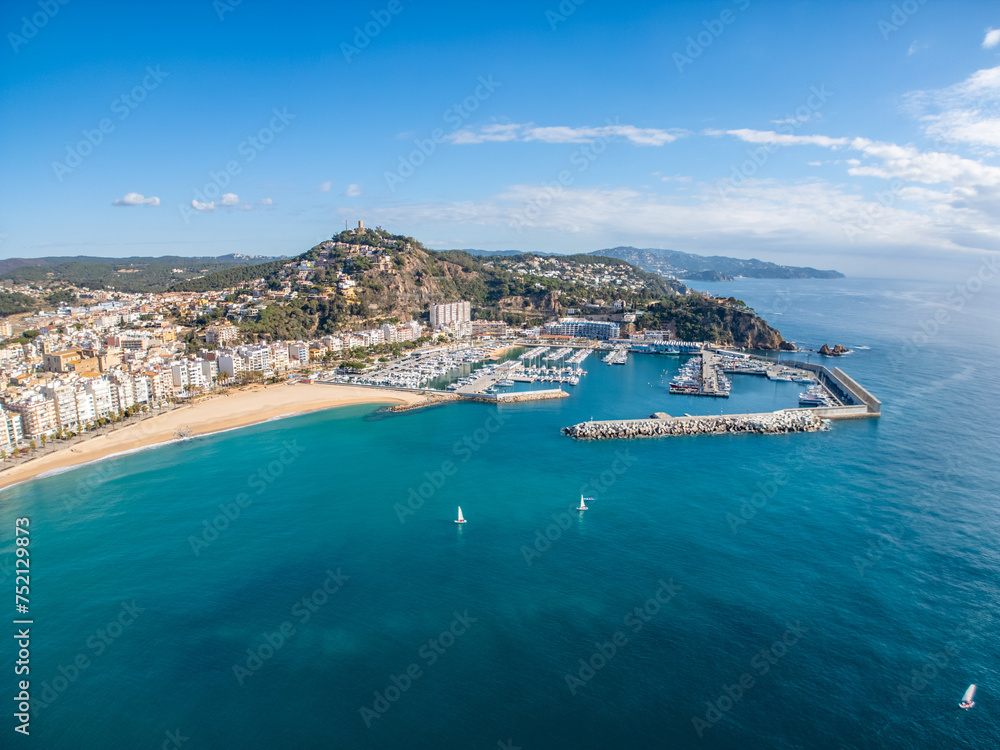 Immerse yourself in the allure of the Costa Brava with our stunning aerial footage. Explore the historic streets of Blanes, where medieval architecture meets the azure waters of the Mediterranean beac